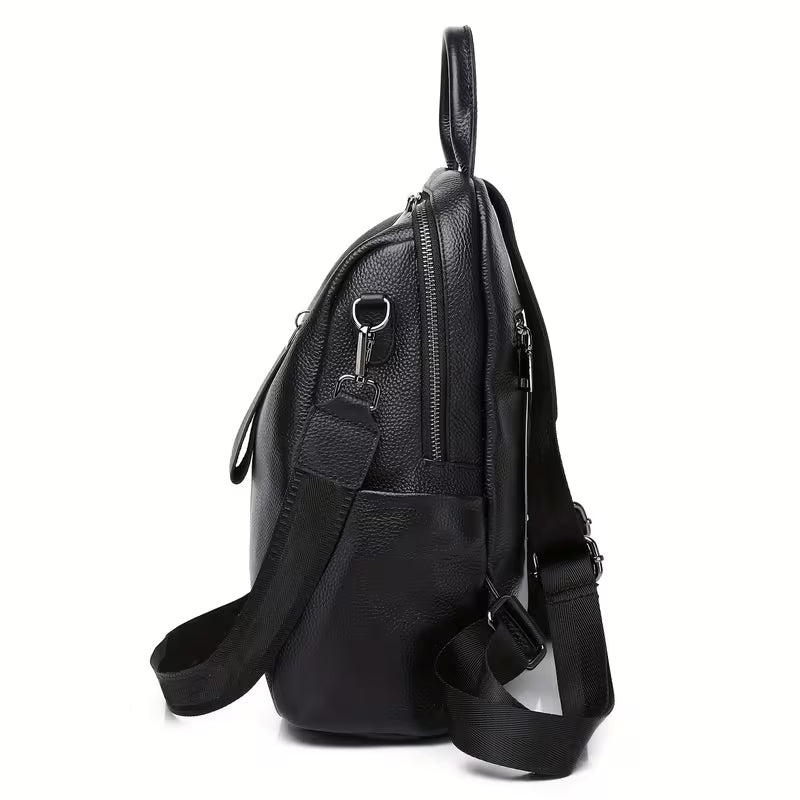 Black leather backpack on a white background